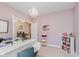 Bright home office with white desk, office supplies, and decorative lighting at 6337 Ederline Ln, Noblesville, IN 46062