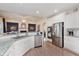 Well-equipped kitchen with stainless steel appliances, granite countertops, and open access to the living area at 6337 Ederline Ln, Noblesville, IN 46062