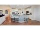 Bright kitchen with stainless steel appliances, granite countertops, and a breakfast bar with seating at 6337 Ederline Ln, Noblesville, IN 46062