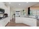 Updated kitchen featuring granite counters, stainless appliances and views to the dining space at 6337 Ederline Ln, Noblesville, IN 46062