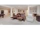 Open-concept living area featuring comfortable seating and seamless access to additional living spaces at 6337 Ederline Ln, Noblesville, IN 46062