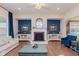 Bright and airy living room features fireplace and open layout at 6337 Ederline Ln, Noblesville, IN 46062