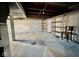 Spacious unfinished basement with concrete floors and exposed ceiling beams at 640 S Sycamore St, Martinsville, IN 46151