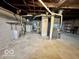 Basement with water heater and washing machine at 640 S Sycamore St, Martinsville, IN 46151