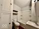 Bathroom with shower and shelves at 640 S Sycamore St, Martinsville, IN 46151