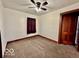 Clean bedroom with carpet and neutral paint at 640 S Sycamore St, Martinsville, IN 46151
