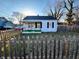 Charming one-story home featuring a covered porch and picket fence at 640 S Sycamore St, Martinsville, IN 46151