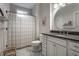Cozy bathroom with shower/tub combo and a granite vanity top at 6450 Holliday E Dr, Indianapolis, IN 46260