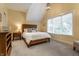Bright and airy bedroom with a vaulted ceiling, natural light, and comfortable furnishings at 6450 Holliday E Dr, Indianapolis, IN 46260