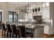 Modern kitchen with a large island, marble countertops, and stainless steel appliances at 6450 Holliday E Dr, Indianapolis, IN 46260