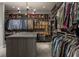 Expansive walk-in closet with custom shelving and ample storage for clothes and accessories at 6450 Holliday E Dr, Indianapolis, IN 46260