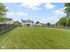 Large, private backyard enclosed by a wooden fence, perfect for pets and recreation at 65 Millet Ct, Danville, IN 46122