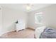 Bright bedroom with hardwood floors, a white dresser and a comfortable beanbag chair at 65 Millet Ct, Danville, IN 46122