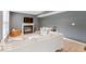 Cozy living room featuring a fireplace, comfortable seating, and soft lighting at 65 Millet Ct, Danville, IN 46122