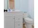 Clean powder room with white vanity, modern fixtures, and a fresh, bright ambiance at 65 Millet Ct, Danville, IN 46122