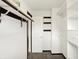 Spacious walk-in closet with shelving and hanging rods for organized storage at 6838 Five Points Rd, Indianapolis, IN 46259
