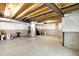 Spacious unfinished basement area showing open joist ceiling, sealed walls, and concrete floor at 7046 Allegiance Ct, Indianapolis, IN 46259