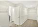 Walk-in closet with door to en-suite bathroom and wire shelving at 7046 Allegiance Ct, Indianapolis, IN 46259