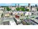 Upscale apartments seamlessly integrate into the city skyline, complemented by well-maintained streets and parks at 727 N Illinois St # 202, Indianapolis, IN 46204