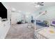Large bonus room with vaulted ceiling, play area, and built-in storage at 7319 Jackie Ct, Indianapolis, IN 46221