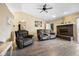 Inviting living room with vaulted ceiling, fireplace, and neutral paint at 7319 Jackie Ct, Indianapolis, IN 46221