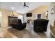 Large living room with wood look vinyl floors, fireplace, and vaulted ceiling at 7319 Jackie Ct, Indianapolis, IN 46221