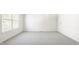 A brightly lit empty bedroom with gray carpet and white walls at 734 Richland Way, Westfield, IN 46074