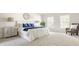 Serene bedroom with a king-size bed, plush carpet, and decorative nightstands at 734 Richland Way, Westfield, IN 46074