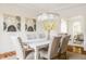 Stylish dining room with a modern chandelier, art, and comfortable seating at 734 Richland Way, Westfield, IN 46074