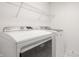 Laundry room featuring new Maytag washer and dryer and storage shelf at 734 Richland Way, Westfield, IN 46074