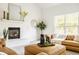 Cozy living room featuring a fireplace, stylish decor, and comfortable seating at 734 Richland Way, Westfield, IN 46074