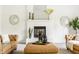 Charming living room featuring a fireplace, mantle decor, and comfortable seating at 734 Richland Way, Westfield, IN 46074