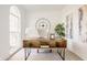 Bright home office featuring a stylish desk, large window, and decorative plants at 734 Richland Way, Westfield, IN 46074