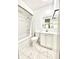Bright bathroom featuring a tub with shower, white vanity, toilet, and tiled floor at 8102 Sycamore Springs Trl, Indianapolis, IN 46239