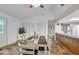 Spacious dining room open to the kitchen with ample seating and natural light at 8102 Sycamore Springs Trl, Indianapolis, IN 46239