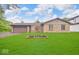 Charming stone facade home featuring a well-manicured lawn and attached two car garage at 8102 Sycamore Springs Trl, Indianapolis, IN 46239