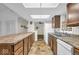 Functional kitchen features lots of counter space and access to the living room at 8102 Sycamore Springs Trl, Indianapolis, IN 46239