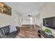 Spacious living room with hardwood floors, providing ample space for furniture and decor at 8102 Sycamore Springs Trl, Indianapolis, IN 46239
