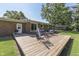 Cozy deck area with seating and grill, a grill perfect for outdoor entertaining and summer barbecues at 8246 S Franklin Rd, Indianapolis, IN 46259