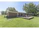 Brick house with a large backyard with a deck and grass at 8246 S Franklin Rd, Indianapolis, IN 46259