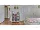 Bedroom with hardwood floors, decor art, and a large closet at 8246 S Franklin Rd, Indianapolis, IN 46259