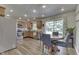 Cozy kitchen and dining area with wood cabinets and stainless steel appliances at 8246 S Franklin Rd, Indianapolis, IN 46259