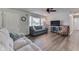 Bright living room features wood floors, ceiling fan, and comfortable seating at 8246 S Franklin Rd, Indianapolis, IN 46259
