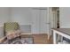 Office space with hardwood floors, stylish chair, and a closet at 8246 S Franklin Rd, Indianapolis, IN 46259