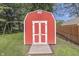 Close-up of a red storage shed, perfect for storing gardening tools and outdoor equipment at 8246 S Franklin Rd, Indianapolis, IN 46259