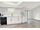 Bright kitchen area featuring sleek white cabinets, stainless steel appliances, and modern finishes at 9002 Walton St, Indianapolis, IN 46231