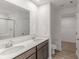 Bathroom featuring a double vanity, and a glass enclosed walk in shower at 9136 Anthem Ave, Plainfield, IN 46168