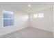 Bright bedroom with neutral carpet, a large window, and clean design at 9136 Anthem Ave, Plainfield, IN 46168