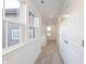 Bright hallway with carpeted floors, white trim, and modern lighting at 9136 Anthem Ave, Plainfield, IN 46168