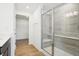 Bathroom featuring a shower and a doorway to a walk-in closet with wire shelving at 9160 Anthem Ave, Plainfield, IN 46168